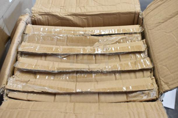 Open cardboard box containing several flat, taped cardboard layers. Box shows signs of wear.