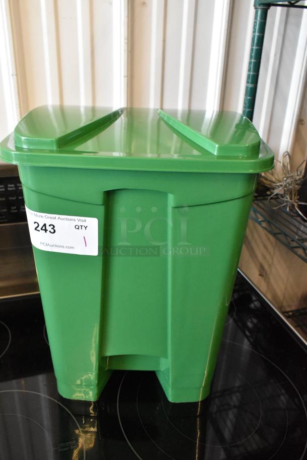 Green plastic container with lid, auction label "243 QTY 1"; in excellent condition for storage use.