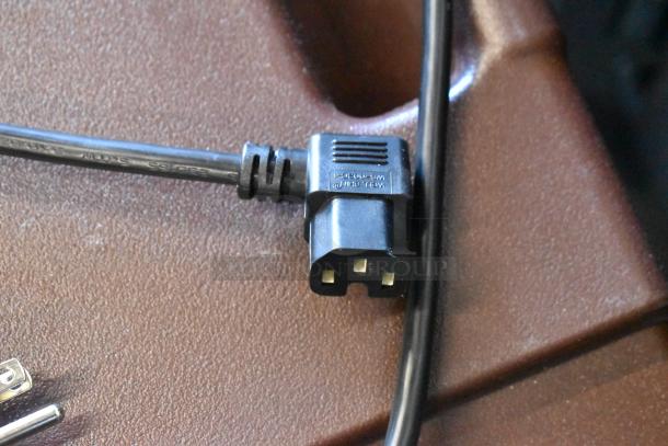 Black power cord with angled plug, labeled "WELL SHIN WS-002," in good condition.