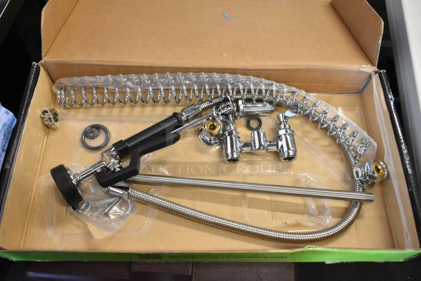 Commercial kitchen pre-rinse faucet set in box, includes chrome-plated brass components, coiled spring, and flexible hose, new condition.