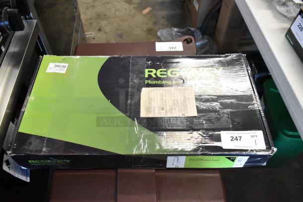 Regency deck mount 8" center pre-rinse faucet, new in box, minor box wear, auction tag showing item 247.