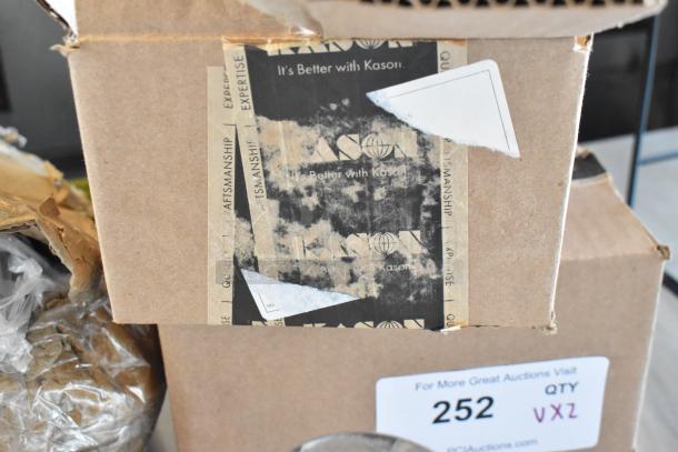 Cardboard box with worn Kason label, marked with auction lot 252 and "QTY VXZ." Edges show signs of wear.