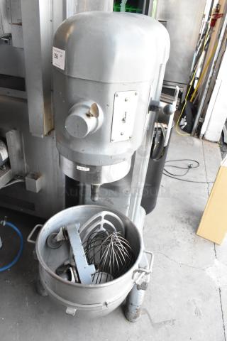 Industrial stand mixer with attachments, sturdy metal construction, large capacity bowl, visible wear, auction tag 256.