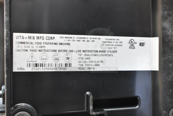 Label of a Vita-Mix commercial food preparing machine, model VM0145, 120V, 15A, serial 036019-ABAB. Made in USA.