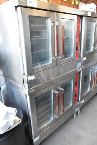 Double stack convection ovens with glass doors and wooden handles. Stainless steel finish. Model R2D2. Unit 262.