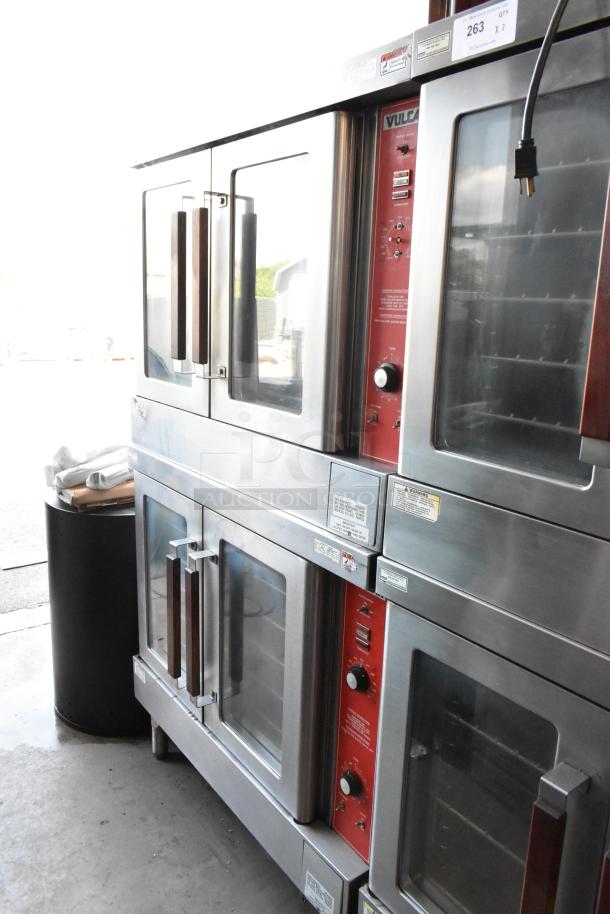 Stacked Vulcan commercial ovens, stainless steel with glass doors, visible controls, in good condition, auction tag 263.
