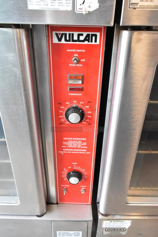 Red control panel of Vulcan commercial oven with thermostat, master switch, and timer. Instructions detailed. Good condition.