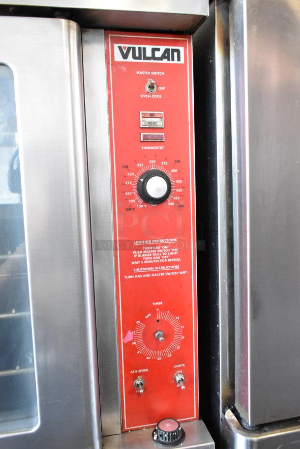 Vulcan commercial oven control panel with thermostat, timer, and fan speed settings. Visible branding and operational instructions.