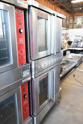 Commercial ovens, Vulcan and Blodgett, stainless steel, digital controls, used condition, model numbers on labels.