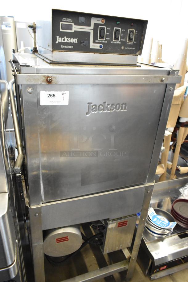 Jackson 200 Series commercial dishwasher. Stainless steel, control panel with power/status buttons. Good condition. Lot tag 265.