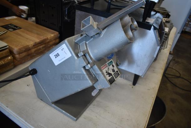 Industrial food processor with metal body, attached power cord, and safety labels. Auction label reads "Lot 268."