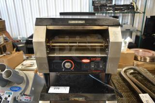 Hatco Toast-Qwik conveyor toaster, model unknown, used condition. Features include color control dial and top/bottom heat switches.