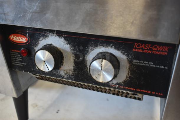 Hatco Toast-Qwik bagel/bun toaster, stainless steel, dual controls, visible wear, labels indicate toasting settings.