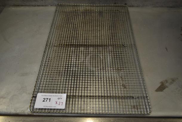 Metal cooling rack on a stainless steel surface with a tag reading "271" and "QTY X 27." Used condition.