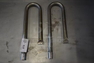 Two U-shaped stainless steel heating elements with perforated design, tagged "272" for auction identification.