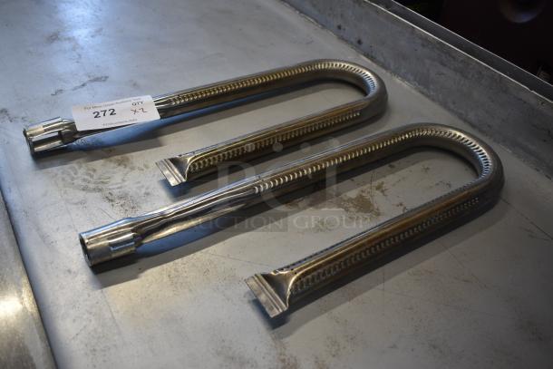 Two stainless steel U-shaped gas burner tubes with perforated edges, item number 272 labeled for auction.