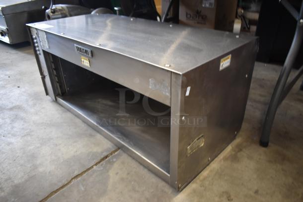 Vulcan stainless steel equipment stand, used condition, featuring a durable construction with visible brand label and safety markings.