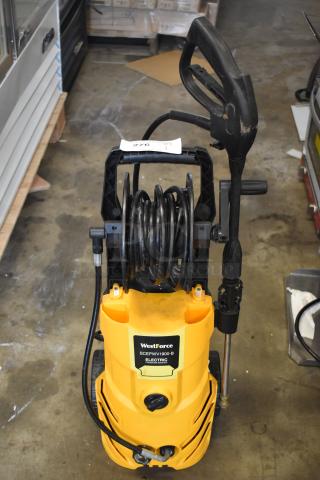 WestForce SCEPW1900-B electric pressure washer, yellow, with hose and nozzle. Good condition. Label indicates model and type.