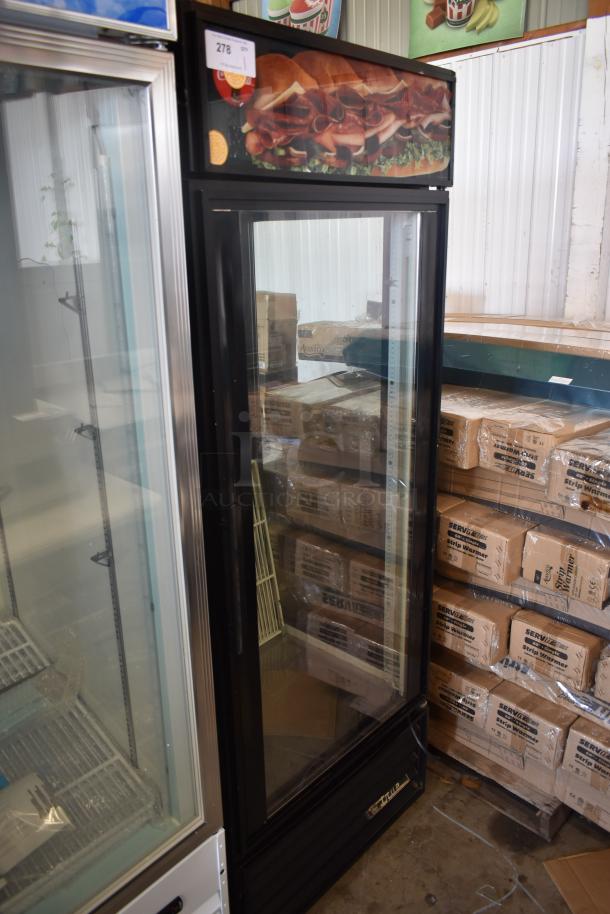 Commercial glass-door refrigerator, black frame, sandwich graphic on top, used condition, auction lot 278.