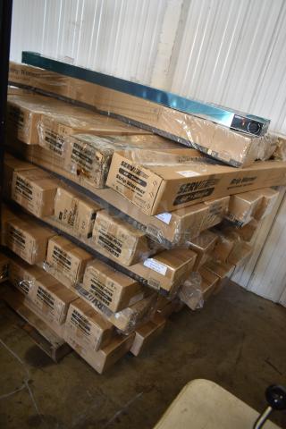 Stack of ServIt 60-inch single strip warmers in original packaging, palletized for sale. Packaging intact; labels visible.