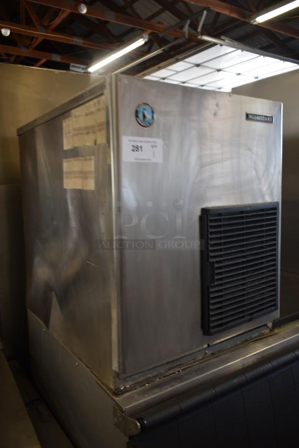 Hoshizaki commercial ice machine, stainless steel, used condition, model details unknown, visible wear, auction tag 281.