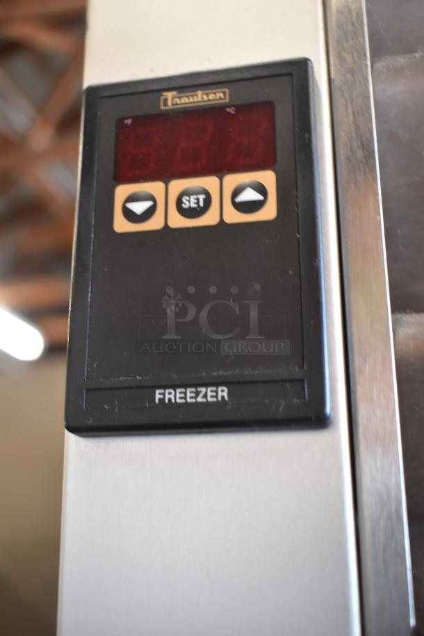 Traulsen freezer digital control panel with temperature display and settings buttons, in good condition.