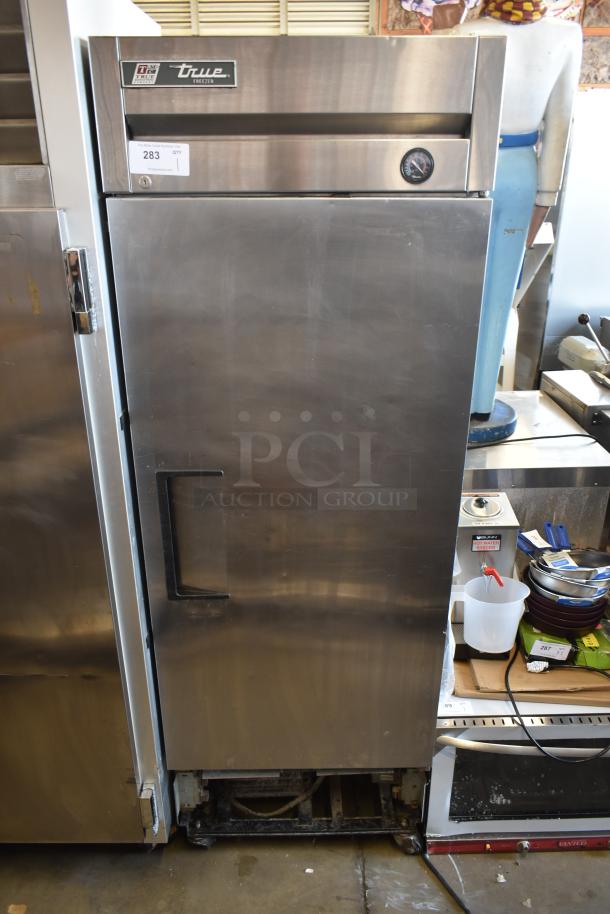 True commercial stainless steel freezer, model GDM, upright design, minor wear, auction lot tag 283.