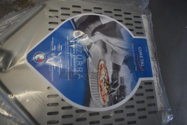 Gi.Metal Azzurra anodized aluminum pizza peel, large perforated surface, Italian made, shown with packaging label.