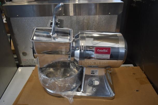 Estella commercial cheese grater, stainless steel, pristine condition, with safety switch. Label indicates model and specs.