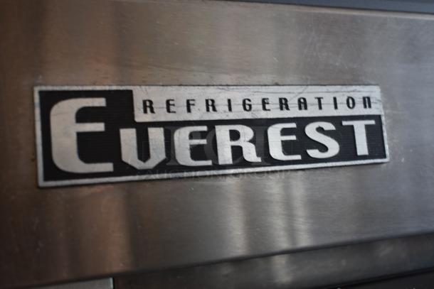 Everest Refrigeration label on stainless steel surface, slight wear visible, denotes brand quality and industrial use.