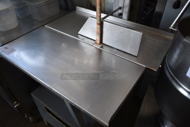 Stainless steel meat slicer, clean surface, adjustable blade guard, visible lot tag indicating "Lot 201," suitable for commercial use.