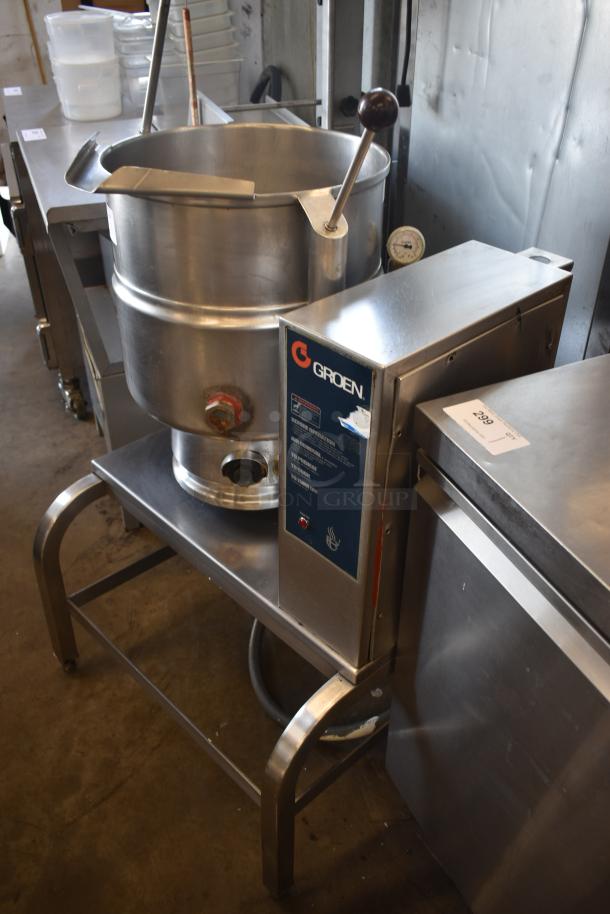 Groen commercial tilting kettle, stainless steel, with control panel, thermometer, and lever, in used condition.