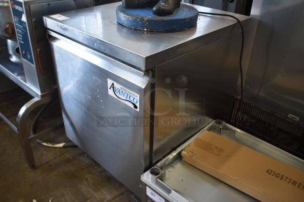 Avantco stainless steel refrigerator, commercial grade, visible wear, labeled with brand logo.