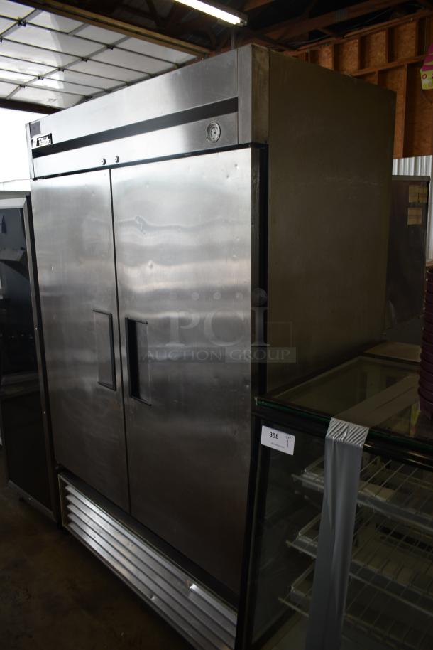 Stainless steel True commercial refrigerator with two doors, visible label, and industrial condition. Auction tag: lot 305.