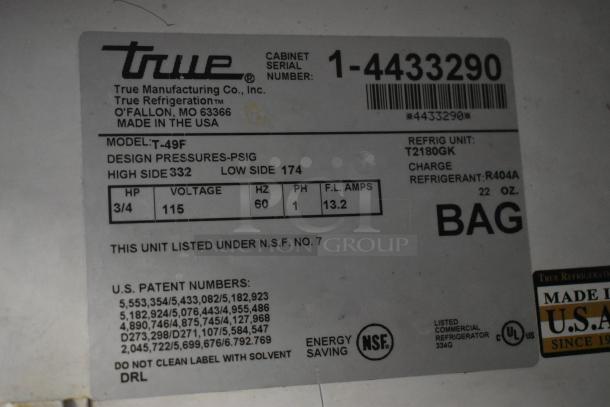 Label of True Refrigeration model T-49F, serial 1-4433290, design pressures high 332, low 174 PSIG, voltage 115V, R404A refrigerant.