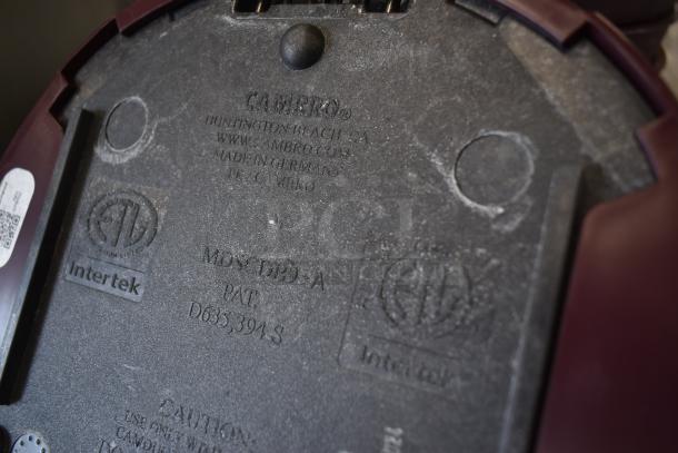 Cambro container base with ETL and Intertek marks, model MDSP9-A, patent D635,394-S, made in Germany, visible wear.