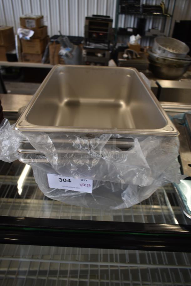 Stainless steel steam table pan, new condition, plastic wrapped, auction label reads "304, QTY VX20, PCI Auctions".