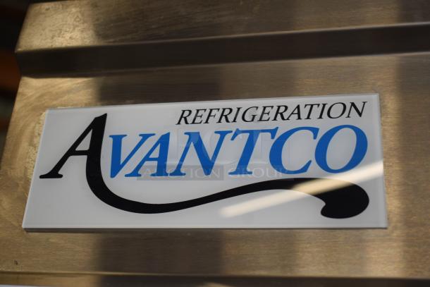 Avantco refrigeration unit label, brushed metal surface, bold black and blue lettering.