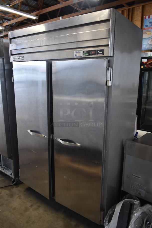 Beverage-Air commercial stainless steel two-door refrigerator, model ER74, in good condition. Visible labels indicate thermostat controls and model.