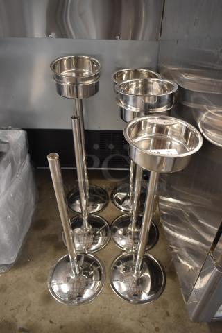 Set of stainless steel standing ashtrays, excellent condition, with round bases and removable bowls, ideal for outdoor use.