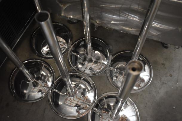 Six chrome stool bases, polished finish, shown from above. Clean condition, suitable for bar or dining stools.