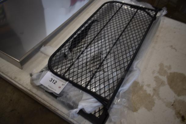 Black metal mesh panel with rectangular grid pattern, in new condition. Auction lot tag marked "312" attached.