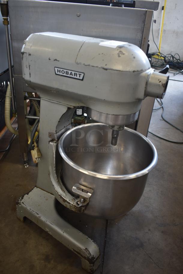 Hobart industrial mixer, worn condition, stainless steel bowl, visible wear and rust on frame, serial tag missing.