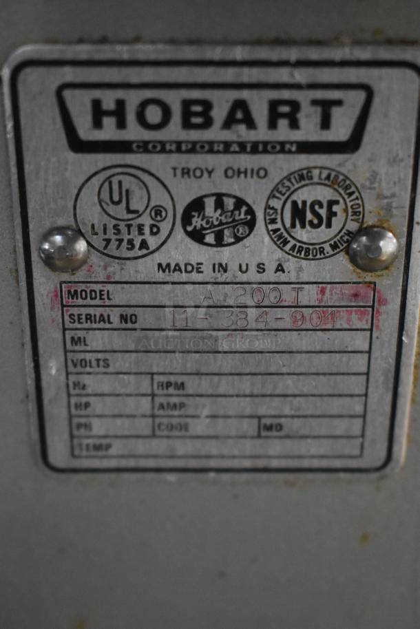 Hobart label showing model A200T, serial 11-384-904, made in USA. UL and NSF certified.