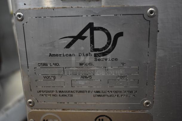 Close-up of American Dish Service label, showing model ET-AF-M, serial 35713, 120 volts, 15 amps, patent 6,484,738.