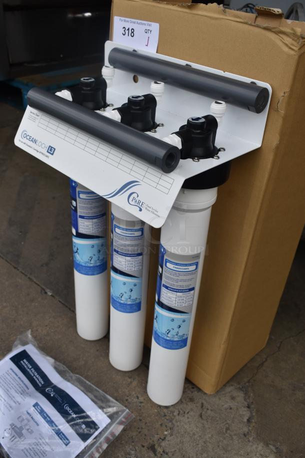 Ocean Loch L3 water filtration system, three filters, new condition. Includes installation manual and specifications. Model 7900CCART.