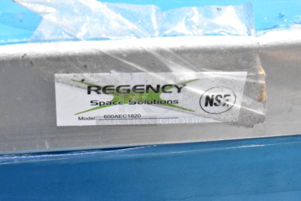 Regency Space Solutions model 600AEC1820 shelf, NSF certified, showing brand label on metal surface. Dust and wear visible.