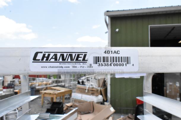 Channel Manufacturing metal shelving unit, model 401AC, barcoded label visible. Appears in good condition.