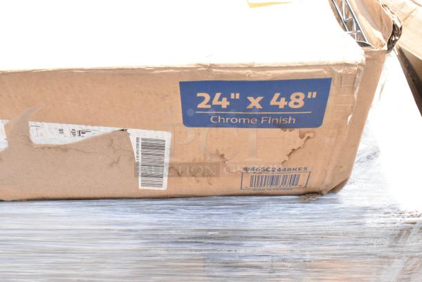 Cardboard box labeled "24" x 48" Chrome Finish," partially damaged, with barcode and "Made in Vietnam" marking.