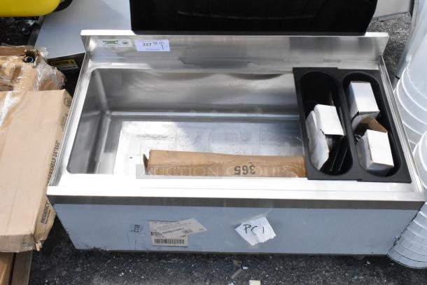 Stainless steel commercial ice bin with condiment trays, model PC1, includes labels and original packaging, gently used.